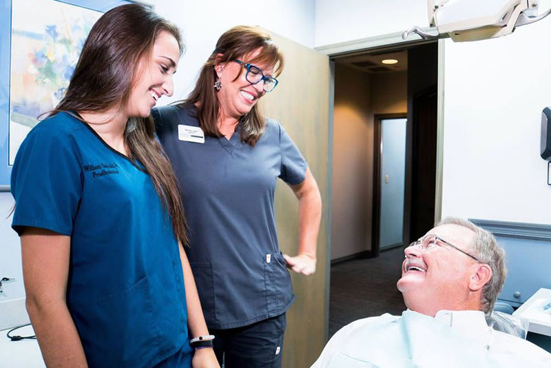 dental patient discussing sedation procedure