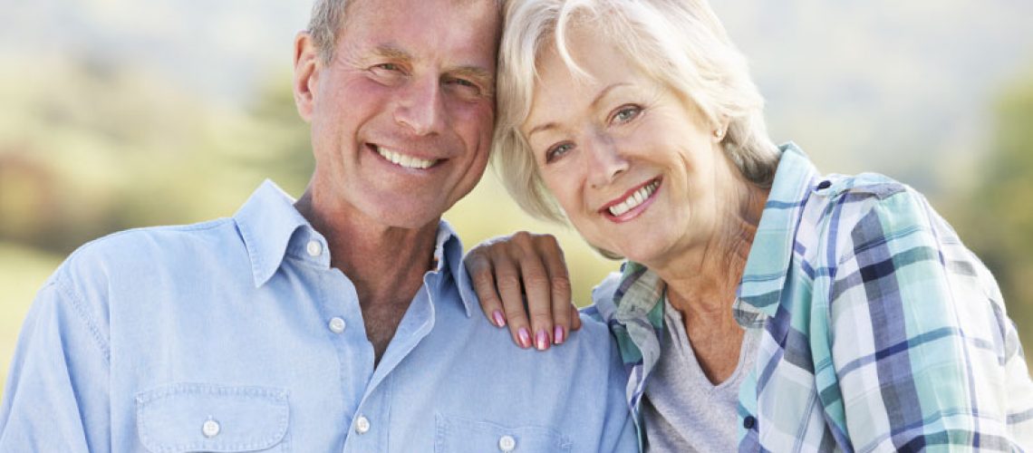 Bone Grafting And Dental Implant Patients Smiling Together